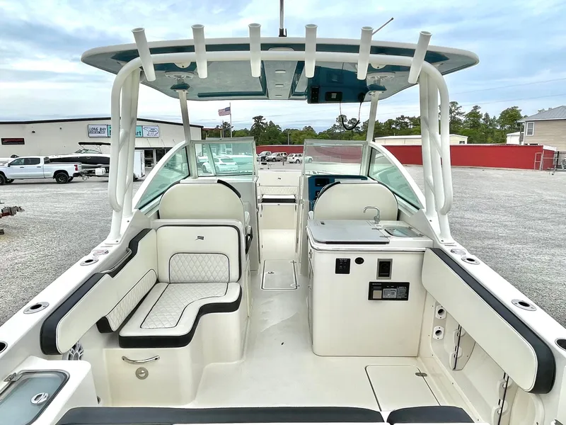 Slide: The Image of Interior view of a 2020 Stingray 269 DC boat with seating area. - 20