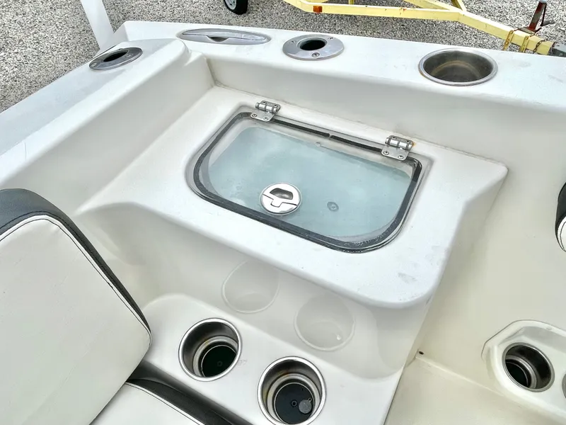 Slide: The Image of Interior of a 2020 Stingray 269 DC boat with cup holders. - 23