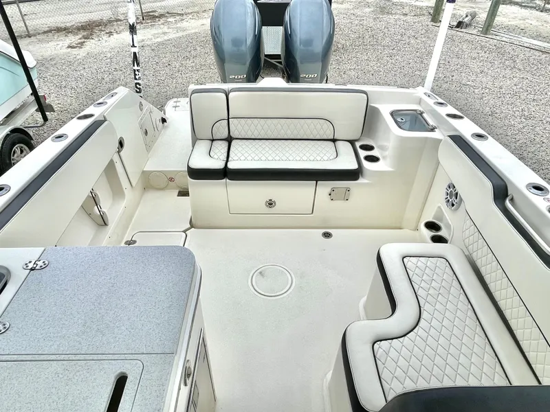 Slide: The Image of Interior of a 2020 Stingray 269 DC boat with seating area. - 28