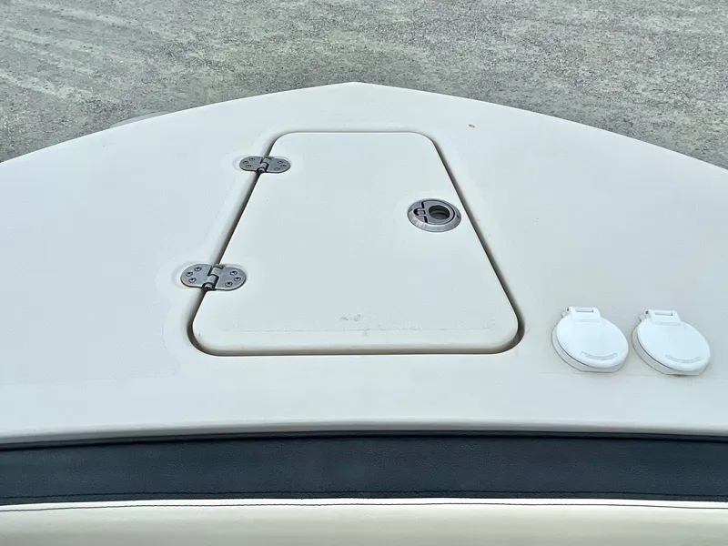 Slide: The Image of Bow deck of 2020 Stingray 269 DC boat with storage compartment. - 37