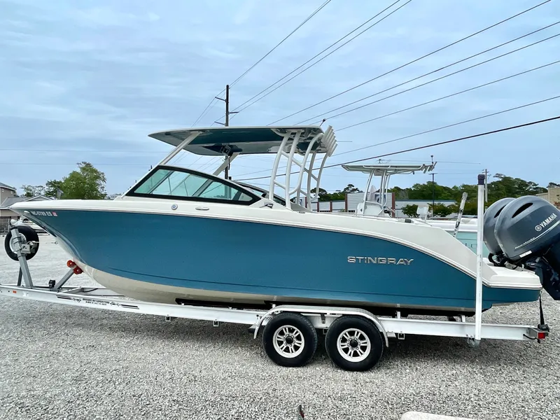 Slide: The Image of 2020 Stingray 269 DC boat on trailer, side view. - 4