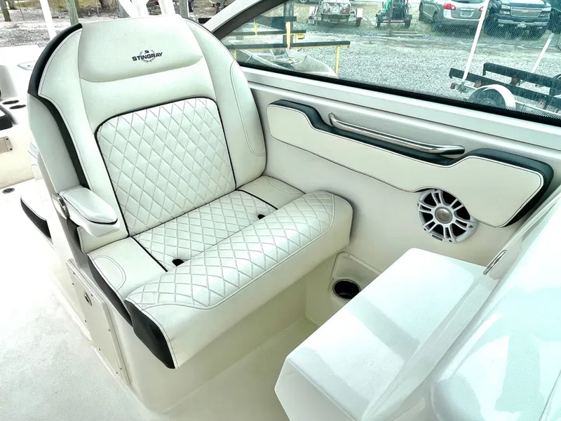 Slide: The Image of Interior of a 2020 Stingray 269 DC with luxurious seating design. - 42