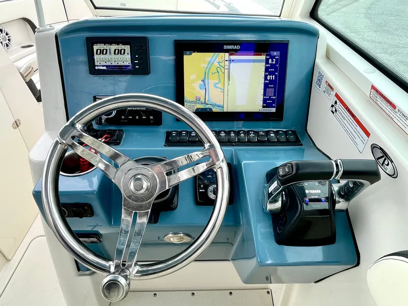 Slide: The Image of 2020 Stingray 269 DC boat helm with navigation system. - 44
