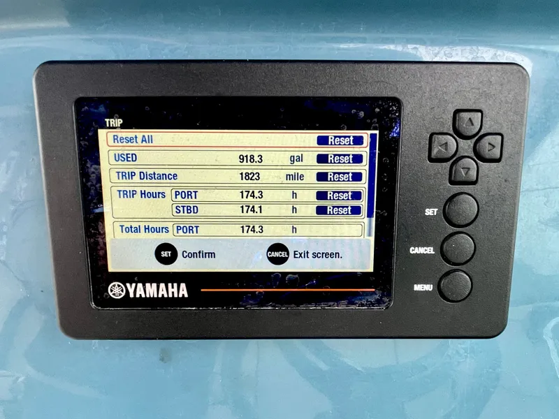 Slide: The Image of Yamaha display on Stingray 269 DC boat, showing trip information. - 46