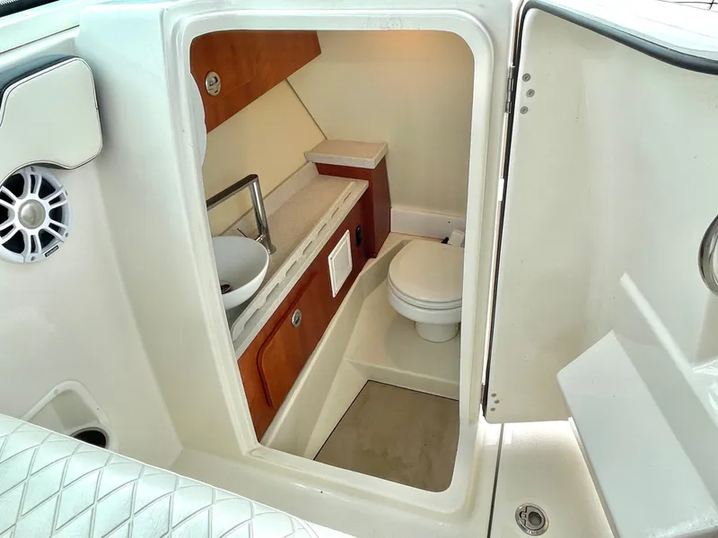 Slide: The Image of Interior of 2020 Stingray 269 DC featuring toilet and sink. - 48