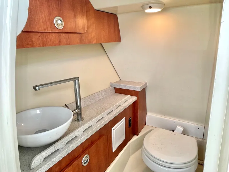 Slide: The Image of Interior of 2020 Stingray 269 DC with sink and toilet. - 49
