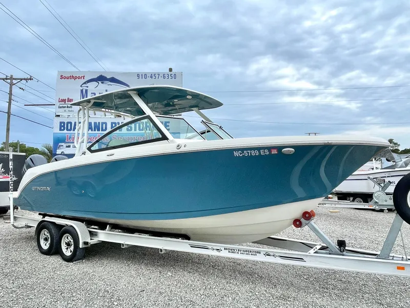 Slide: The Image of 2020 Stingray 269 DC boat on trailer at Southport Marine. - 9