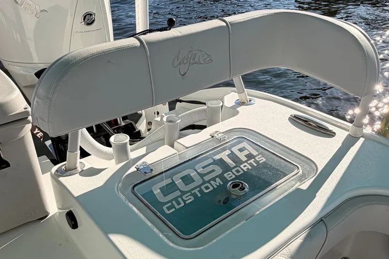 Slide: The Image of 2020 Costa Custom Boats 264 HC with sleek design and modern features on water. - 13