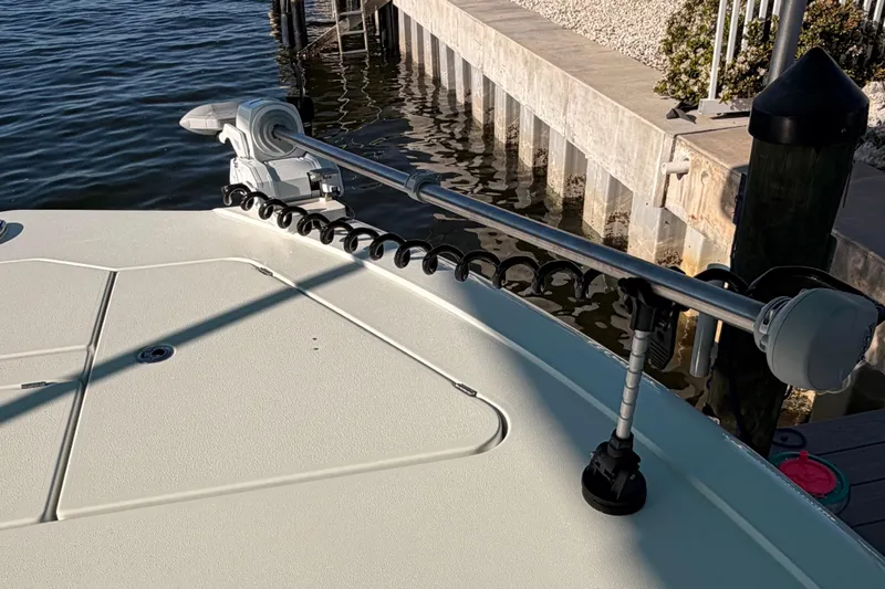Slide: The Image of 2020 Costa Custom Boats 264 HC bow with trolling motor at dockside. - 20