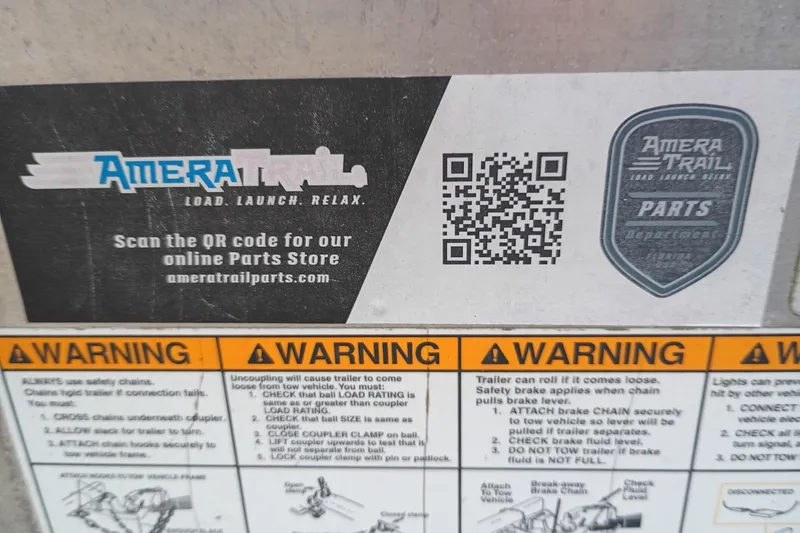 Slide: The Image of QR code for Amera Trail parts store with safety warnings on Costa Custom Boats 264HC, 2020 model. - 34