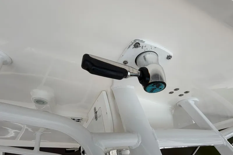 Slide: The Image of Close-up of a 2016 Sea Hunt Gamefish 25 boat's control lever mechanism. - 25