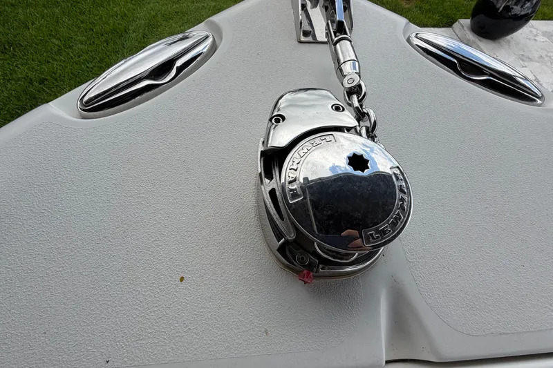 Slide: The Image of 2016 Sea Hunt Gamefish 25 boat anchor winch on deck, featuring Lewmar equipment. - 32