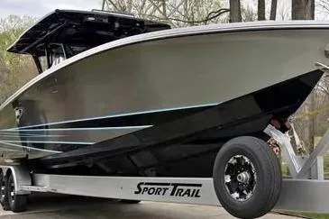 Slide: The Image of 2022 Nor-Tech 390 Sport Center Console boat on Sport Trail trailer. - 3