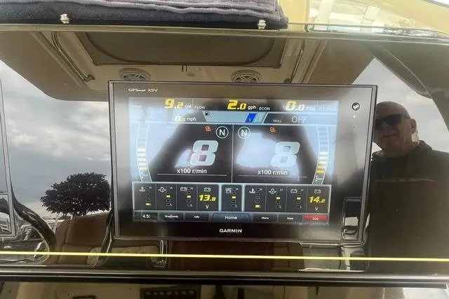 Slide: The Image of Garmin display on 2017 Scout 320 LXF boat showing engine metrics and navigation data. - 41