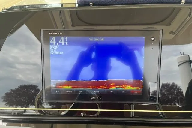 Slide: The Image of Garmin GPS display on 2017 Scout 320 LXF boat showing depth and sonar data. - 42