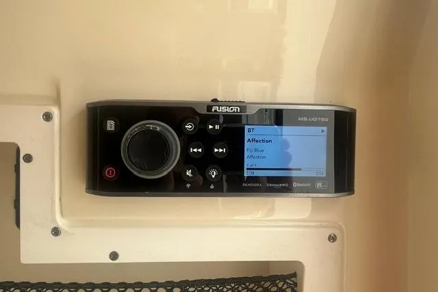 Slide: The Image of Fusion MS-UD750 stereo system on 2017 Scout 320 LXF boat dashboard. - 53