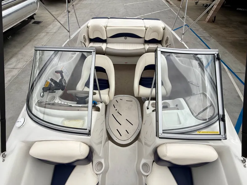 Slide: The Image of Interior view of a 2006 Tracker Tahoe Q6 SF boat with seating. - 9