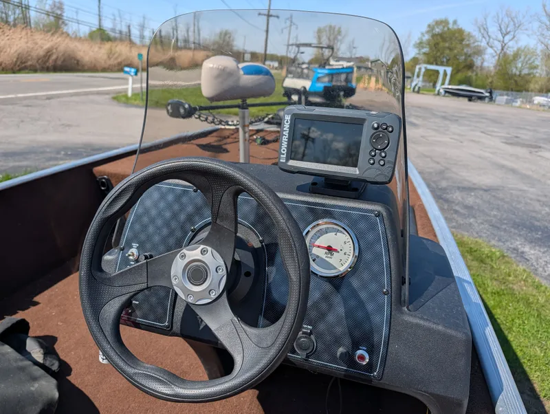 Slide: The Image of 2018 Tracker Bass Tracker boat console with Lowrance GPS and tachometer. - 5