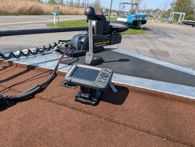 Slide: The Image of 2018 Tracker Bass boat with Minn Kota motor and Lowrance display. - 6
