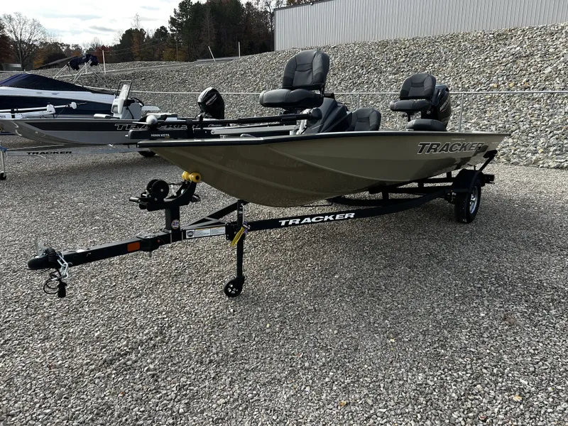 Slide: The Image of 2026 Tracker Pro Team 175 boat on trailer, gray gravel background. - 10
