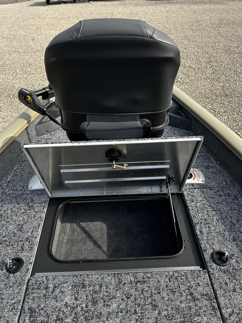 Slide: The Image of Tracker Pro Team 175 2026 with open storage compartment and seat. - 13