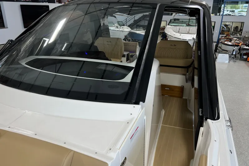 Slide: The Image of 2025 Sea Ray Sundancer 370 Outboard interior view, showcasing sleek design and comfortable seating. - 28