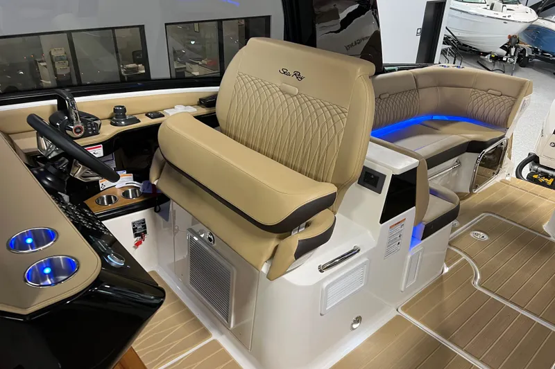Slide: The Image of Luxurious interior of 2025 Sea Ray Sundancer 370 Outboard with plush seating and modern controls. - 30