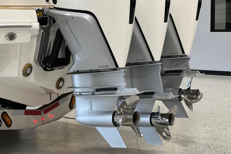 Slide: The Image of Triple outboard engines on a 2025 Sea Ray Sundancer 370, showcasing sleek design and power. - 37