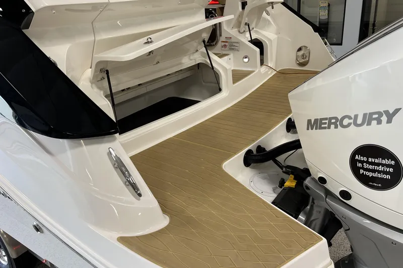 Slide: The Image of 2025 Sea Ray Sundancer 370 Outboard with Mercury engine, showcasing spacious deck and storage. - 7