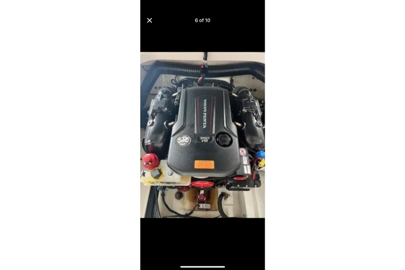 Slide: The Image of Engine of 2020 Chaparral 25 Surf boat, featuring Volvo Penta branding. - 5