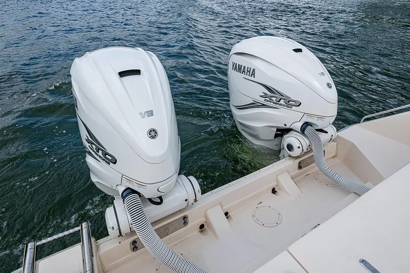 Slide: The Image of 2020 Grady-White Canyon 336 with dual Yamaha V8 outboard engines on water. - 17