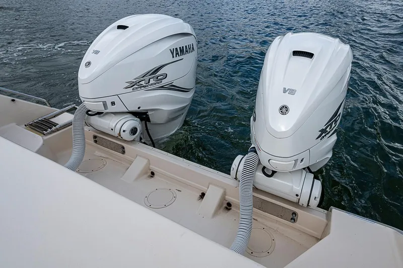Slide: The Image of 2020 Grady-White Canyon 336 with twin Yamaha XTO Offshore V8 engines on water. - 18
