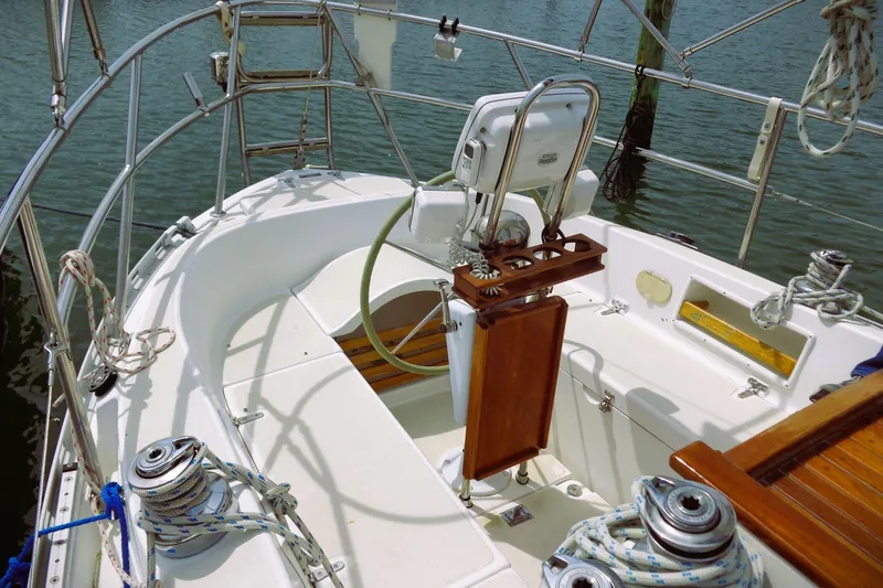 Slide: The Image of Cockpit of 2009 Pacific Seacraft 34 sailboat with steering wheel and rigging details. - 9
