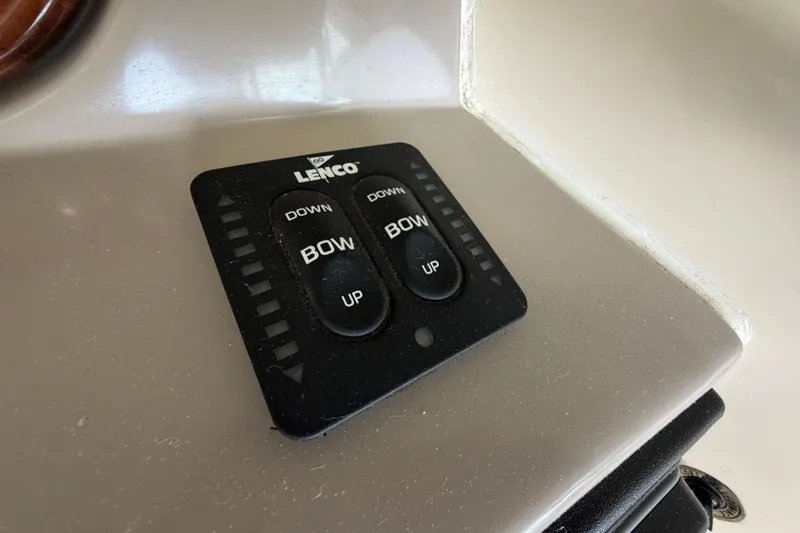 Slide: The Image of Lenco trim tab control panel on 2005 Rinker 282 Captiva Bowrider boat. - 14