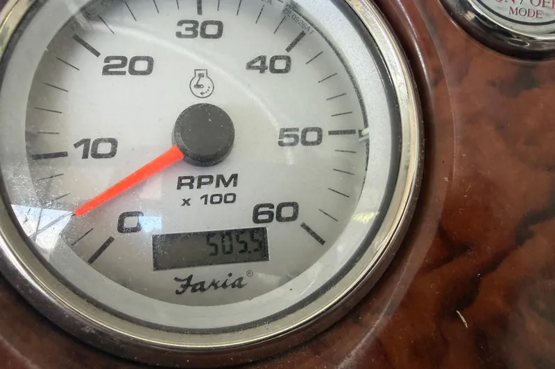 Slide: The Image of Close-up of a Faria RPM gauge on a 2005 Rinker 282 Captiva Bowrider. - 16