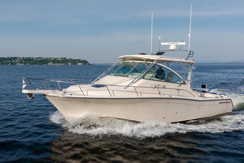 The Image of 2006 Grady-White Express 360 boat cruising on open water, side view. - 0