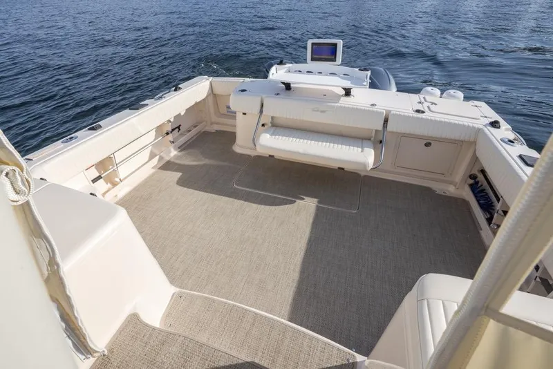 Slide: The Image of Spacious deck of 2006 Grady-White Express 360 boat on calm water. - 12