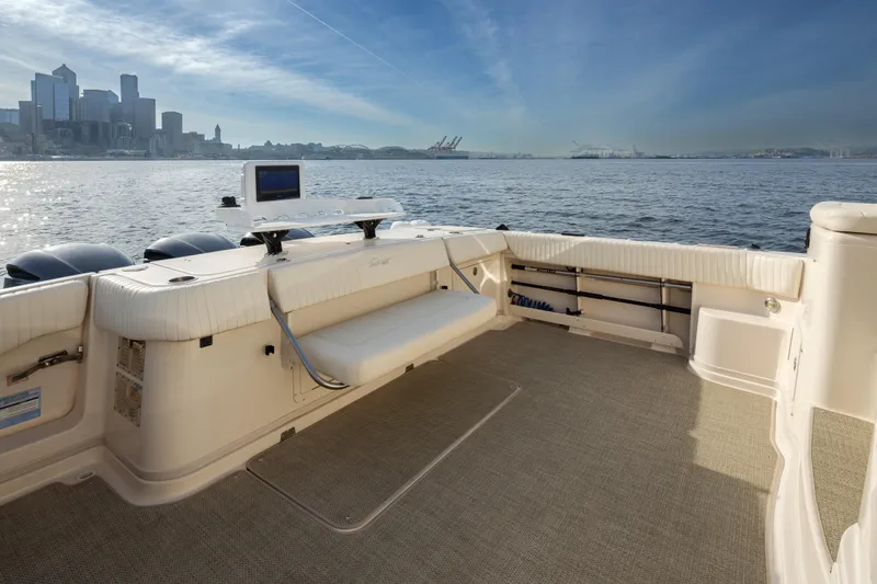 Slide: The Image of 2006 Grady-White Express 360 boat interior with city skyline and ocean view. - 13
