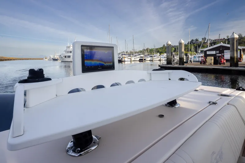 Slide: The Image of 2006 Grady-White Express 360 boat with navigation display at marina dock. - 15