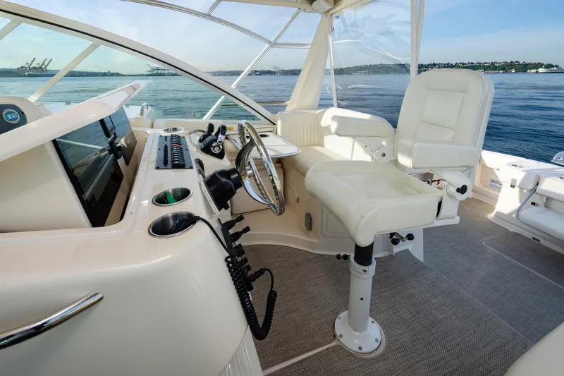 Slide: The Image of 2006 Grady-White Express 360 helm with luxurious seating and ocean view. - 18
