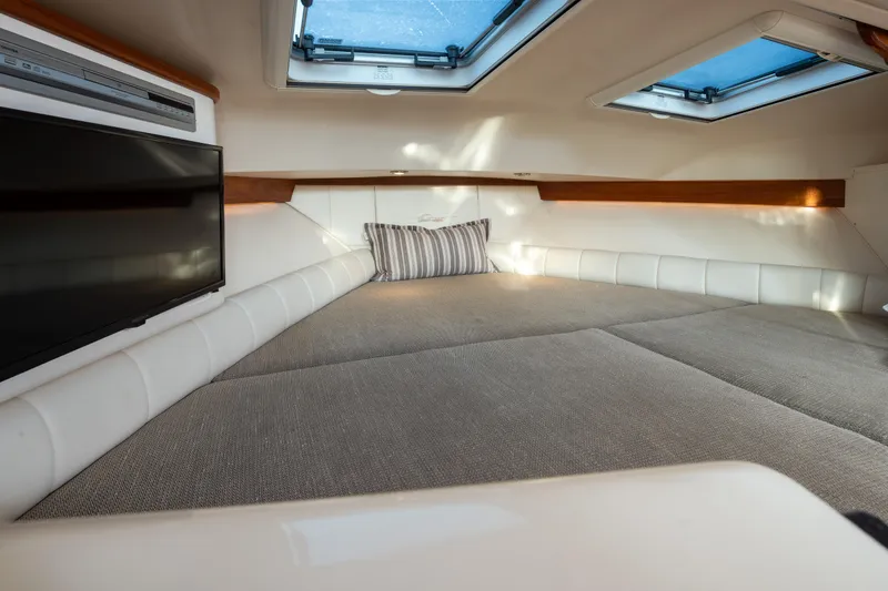 Slide: The Image of Luxurious cabin interior of 2006 Grady-White Express 360 with skylights and TV. - 27