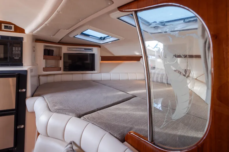 Slide: The Image of Luxurious interior of 2006 Grady-White Express 360 boat with cozy seating and modern amenities. - 28