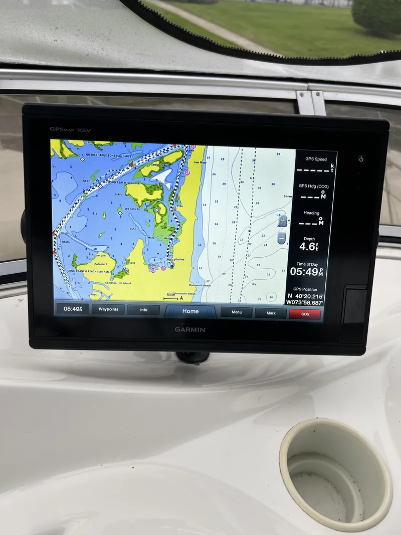 Slide: The Image of Garmin navigation display on 2005 Meridian 459 Motoryacht, showing nautical map and data. - 20