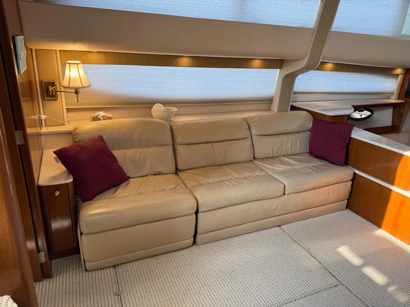Slide: The Image of Luxurious interior of 2005 Meridian 459 Motoryacht with beige leather sofa and elegant decor. - 29