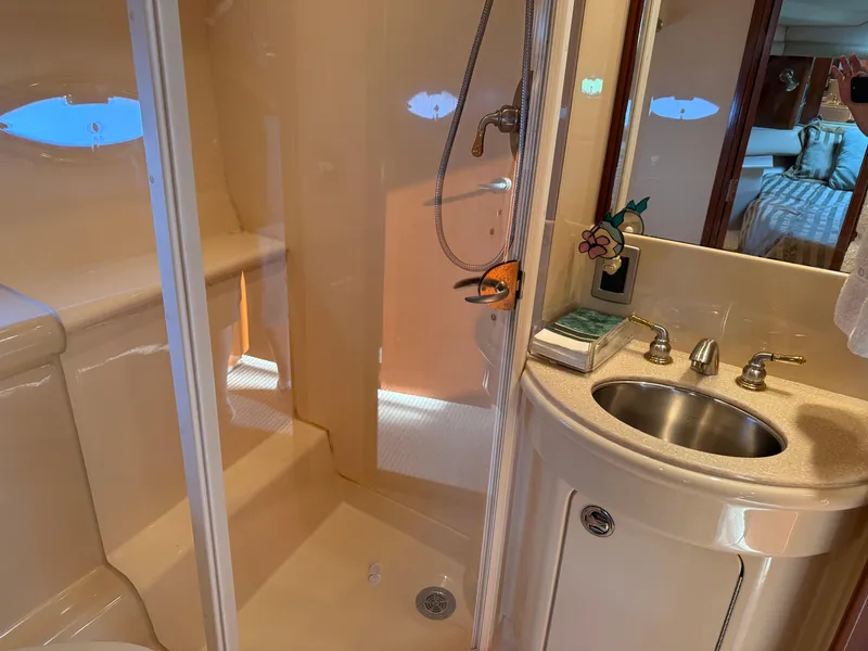 Slide: The Image of Bathroom interior of 2005 Meridian 459 Motoryacht with shower and sink. - 43