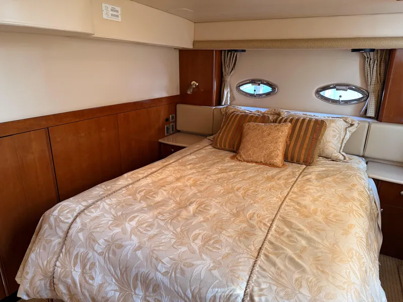 Slide: The Image of Luxurious bedroom in a 2005 Meridian 459 Motoryacht. - 49