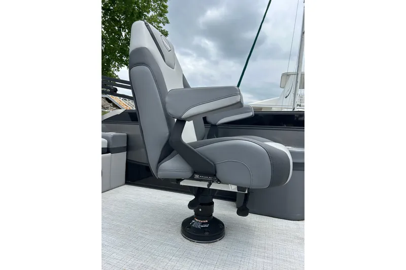 Slide: The Image of Gray captain's chair on a 2025 South Bay 525UL393 boat, featuring sleek design and comfort. - 23