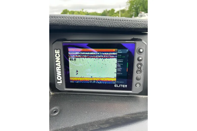 Slide: The Image of Lowrance Elite fish finder on 2025 South Bay 525 Tritoon, displaying sonar data. - 46