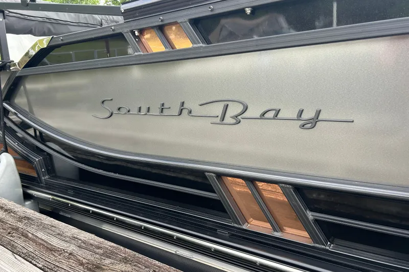 Slide: The Image of 2025 South Bay 525UL393 boat with sleek design and metallic finish. - 13