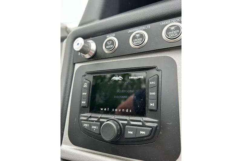 Slide: The Image of 2025 South Bay 525UL393 boat audio system with Bluetooth connectivity options and control buttons. - 16